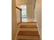 Carpeted staircase leading to the upper level of the home at 1035 Towne Manor Nw Ct, Kennesaw, GA 30144