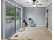 Dining area with gray walls, access to the deck, and a ceiling fan at 1729 Norden Rd, Riverdale, GA 30296