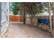 View of the backyard area with a wood fence and wood storage at 220 Chandler Ct, Sugar Hill, GA 30518