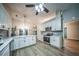 Spacious kitchen with modern appliances, large island, and lots of storage at 220 Chandler Ct, Sugar Hill, GA 30518