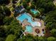 Aerial view of the neighborhood pool with multiple pools, a slide, and plenty of lounge chairs at 338 Boundless Ln, Canton, GA 30114