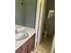 This bathroom offers a single sink vanity and a toilet and shower combination at 6192 Meadowbrook Dr, Norcross, GA 30093