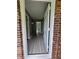 Inviting entryway features stylish gray wood-look flooring and crisp white trim, offering a bright and modern feel at 6192 Meadowbrook Dr, Norcross, GA 30093