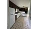 View of the kitchen with white cabinets and modern appliances at 6192 Meadowbrook Dr, Norcross, GA 30093