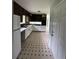 Kitchen with white cabinetry and modern appliances at 6192 Meadowbrook Dr, Norcross, GA 30093
