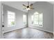 Bedroom features hardwood floors, vaulted ceilings, and plenty of natural light from many windows at 21 Spring Folly Nw, Cartersville, GA 30121