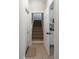 Hallway features tile floors, stairs, and an entrance to the kitchen at 21 Spring Folly Nw, Cartersville, GA 30121