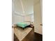 Bedroom with hardwood floors, lots of windows, a comfortable bed and a large rug at 5090 Bellehurst Ln, Cumming, GA 30040