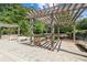 Outdoor grilling area with a built-in grill, stone accents, and seating, perfect for entertaining at 799 Hammond Dr # 325, Atlanta, GA 30328