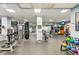 Community gym featuring exercise equipment, weights, and mirrors at 799 Hammond Dr # 325, Atlanta, GA 30328