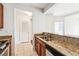 Modern kitchen features granite countertops, stainless steel appliances and wood cabinets at 799 Hammond Dr # 325, Atlanta, GA 30328