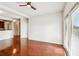 Open-concept living room with hardwood floors and abundant natural light at 799 Hammond Dr # 325, Atlanta, GA 30328