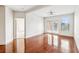 Bright living room with sleek hardwood floors, modern ceiling fan and bright windows at 799 Hammond Dr # 325, Atlanta, GA 30328