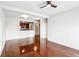Hardwood floors in open-concept living room with access to kitchen at 799 Hammond Dr # 325, Atlanta, GA 30328