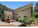 Home exterior featuring a wooden deck and large windows to view backyard at 100 Hamilton Glen Ct, Fayetteville, GA 30215