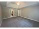 Large bedroom with plush carpeting and en-suite bathroom at 100 Hamilton Glen Ct, Fayetteville, GA 30215