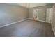 Large bedroom with plush carpeting leads into an ensuite bathroom at 100 Hamilton Glen Ct, Fayetteville, GA 30215