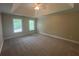 Spacious bedroom with tray ceilings, plush carpeting and lots of natural light at 100 Hamilton Glen Ct, Fayetteville, GA 30215