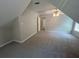 Large bedroom featuring plush carpeting, neutral paint and an open closet space at 100 Hamilton Glen Ct, Fayetteville, GA 30215