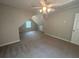 Spacious bedroom features plush carpeting and a ceiling fan for optimal comfort at 100 Hamilton Glen Ct, Fayetteville, GA 30215