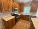 Well-equipped kitchen featuring stainless steel appliances and countertops at 100 Hamilton Glen Ct, Fayetteville, GA 30215