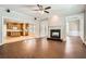 Spacious living room with fireplace and kitchen access at 100 Hamilton Glen Ct, Fayetteville, GA 30215