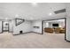 Spacious basement with open floor plan, neutral paint, and carpeting at 1045 River Pt, Suwanee, GA 30024