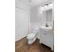 Well-maintained bathroom with a vanity, toilet, and closet space at 1045 River Pt, Suwanee, GA 30024