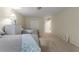 Bright bedroom with two beds, neutral walls, and a double door closet for ample storage at 2240 Six Branches Dr, Roswell, GA 30076