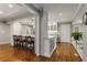 Modern kitchen with stainless steel appliances, island with seating, and ample counter space at 2240 Six Branches Dr, Roswell, GA 30076