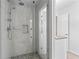 Modern bathroom with glass enclosed shower, tile surround and floors at 3131 Sumter Ct, Marietta, GA 30062