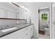 Bright bathroom featuring double sinks, and a large mirror at 3131 Sumter Ct, Marietta, GA 30062