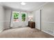 Serene bedroom featuring neutral carpet, ample natural light, and a cozy ambiance at 3131 Sumter Ct, Marietta, GA 30062