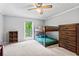 Bright bedroom with bunk beds, a large window, and ample closet space at 3131 Sumter Ct, Marietta, GA 30062