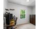Bedroom with desk, chair, shelving and neutral walls at 3131 Sumter Ct, Marietta, GA 30062