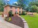 Beautiful two-story brick home with a manicured lawn and a welcoming front entrance at 3131 Sumter Ct, Marietta, GA 30062