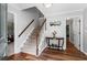 Inviting foyer with hardwood floors, staircase, and views into adjacent rooms at 3131 Sumter Ct, Marietta, GA 30062