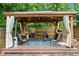 Relaxing backyard gazebo with comfortable seating and stylish decor at 3131 Sumter Ct, Marietta, GA 30062