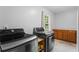 Functional laundry room equipped with modern washer and dryer units at 3131 Sumter Ct, Marietta, GA 30062