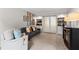 Cozy living room with neutral carpet, built-in shelving, and comfortable seating at 3131 Sumter Ct, Marietta, GA 30062