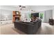 Open living room featuring a brick fireplace, ceiling fans, and neutral-toned decor at 3131 Sumter Ct, Marietta, GA 30062