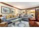Inviting living room with comfortable sofas, decorative pillows, and wood trim at 4782 Donnegal Se Ct, Mableton, GA 30126