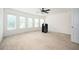 Spacious bonus room with carpet, recessed lights and large windows at 558 Olympic Way, Acworth, GA 30102