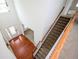 Elegant two-story foyer with hardwood floors and staircase at 558 Olympic Way, Acworth, GA 30102