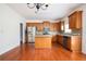 Open kitchen layout with stainless steel appliances, a central island, and a bright, airy feel at 558 Olympic Way, Acworth, GA 30102