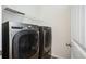Updated laundry room with gray washer and dryer at 558 Olympic Way, Acworth, GA 30102