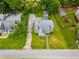 Birds eye view of a well-maintained property with a lush green lawn and mature trees at 8573 Campbellton St, Douglasville, GA 30134
