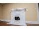 Close-up on a decorative fireplace with white brick surround at 8573 Campbellton St, Douglasville, GA 30134