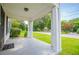 Spacious front porch with columns, providing a welcoming outdoor space at 8573 Campbellton St, Douglasville, GA 30134