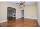 Bright living room with hardwood floors and a decorative fireplace for a cozy feel at 8573 Campbellton St, Douglasville, GA 30134